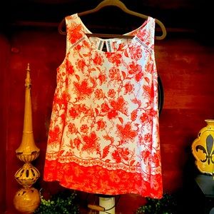 Orange and white Soie’blu top with a peekaboo back